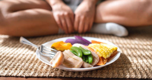 Mindful eating with a colorful plate of healthy food.