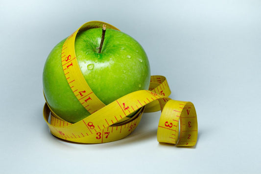 Apfel und Massband schnell abnehmen
