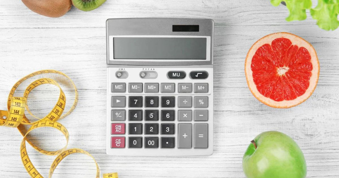 Counting calories with fruits, tape measure, and calculator.
